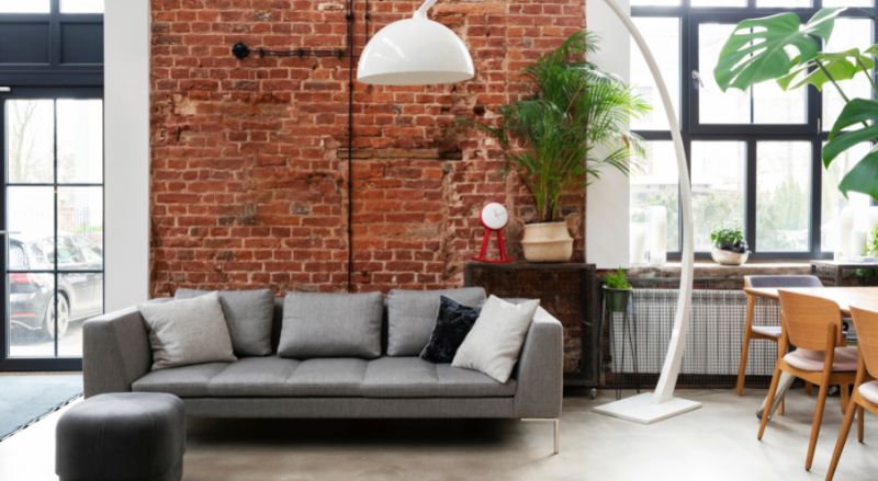 mur en brique dans un logement de style industriel